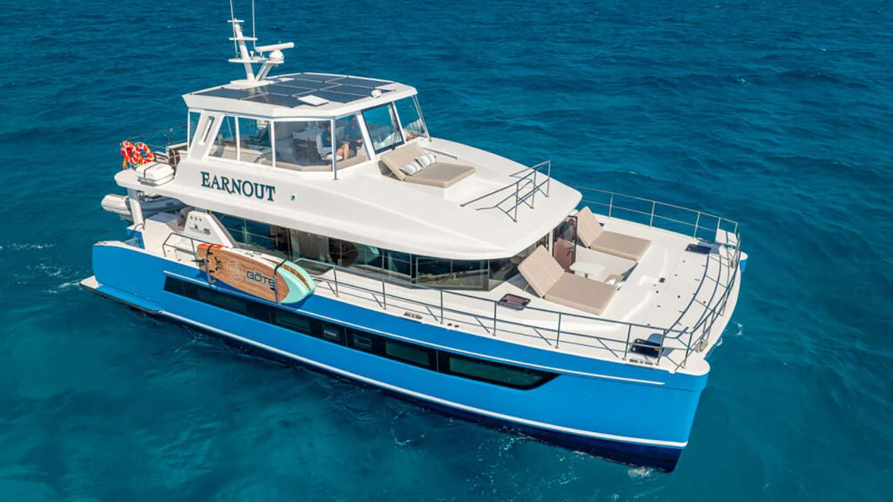 Earnout Crewed Two Oceans 555 Powercat Charter Cruising the BVI and Bahamas